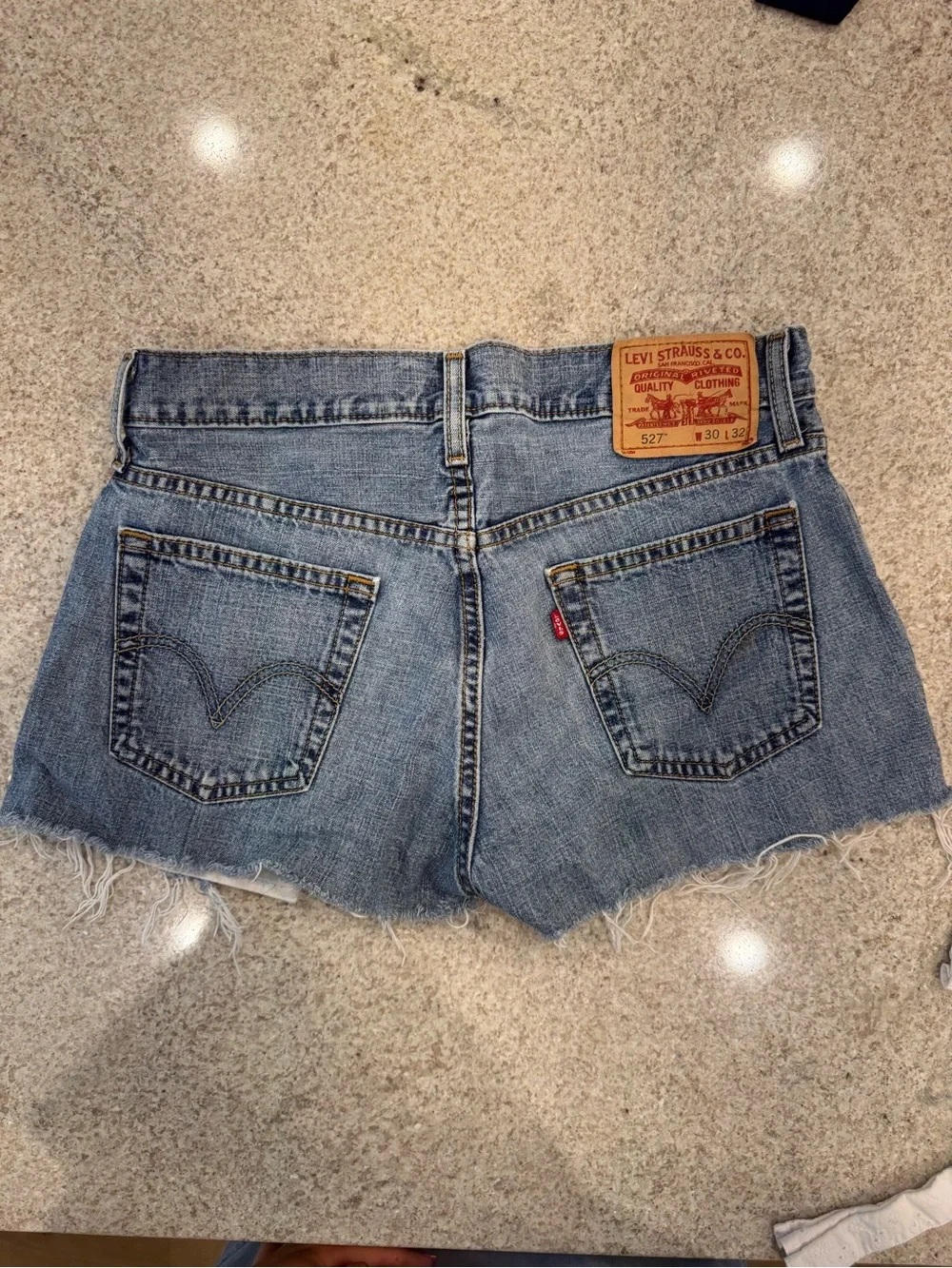 Levi's Distressed Blue Denim Shorts with Frayed Hem - Picture 3 of 3